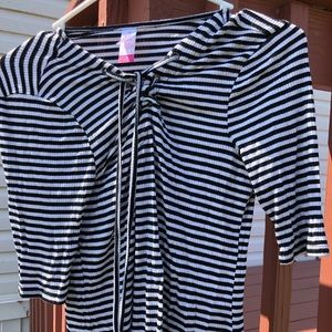a stripped white and black shirt size M